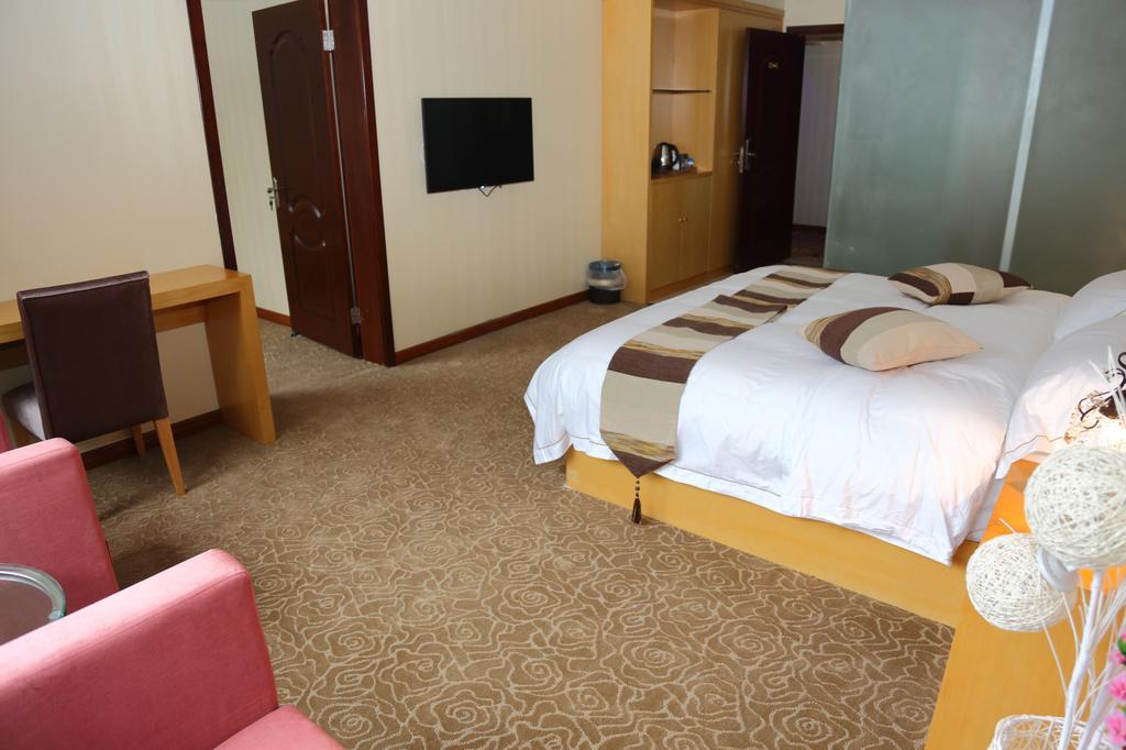 Panshan Tingquan Tuwo Holiday Resort Le-šan Pokoj fotografie