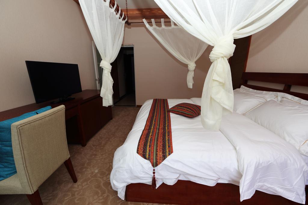 Panshan Tingquan Tuwo Holiday Resort Le-šan Pokoj fotografie