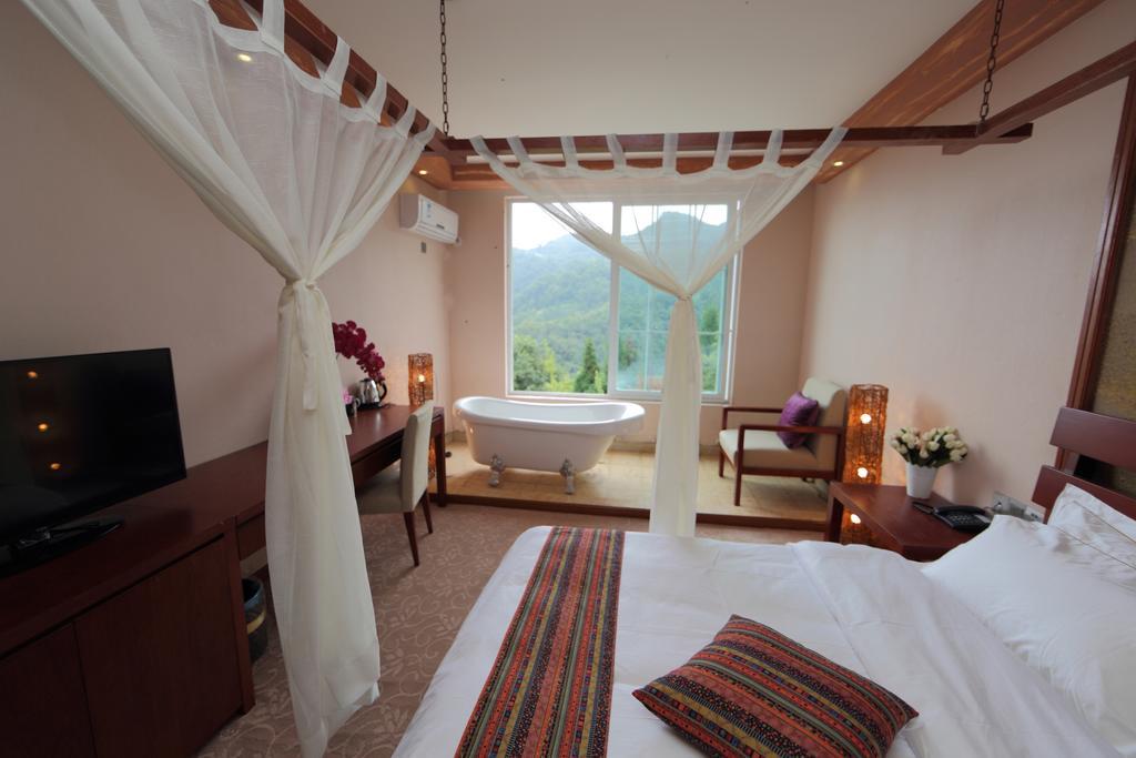 Panshan Tingquan Tuwo Holiday Resort Le-šan Pokoj fotografie