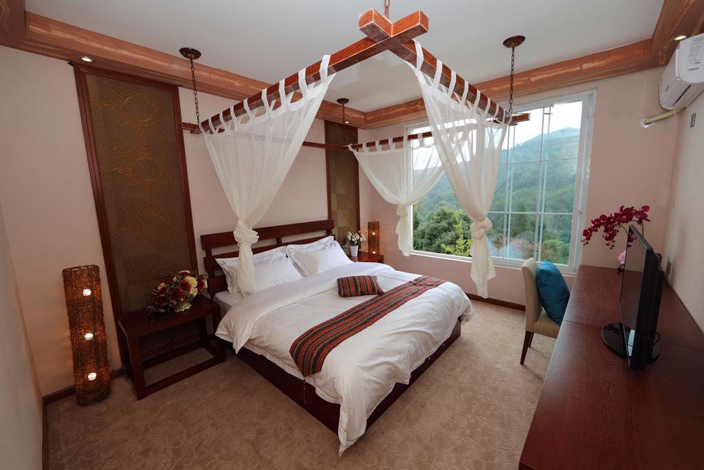 Panshan Tingquan Tuwo Holiday Resort Le-šan Pokoj fotografie