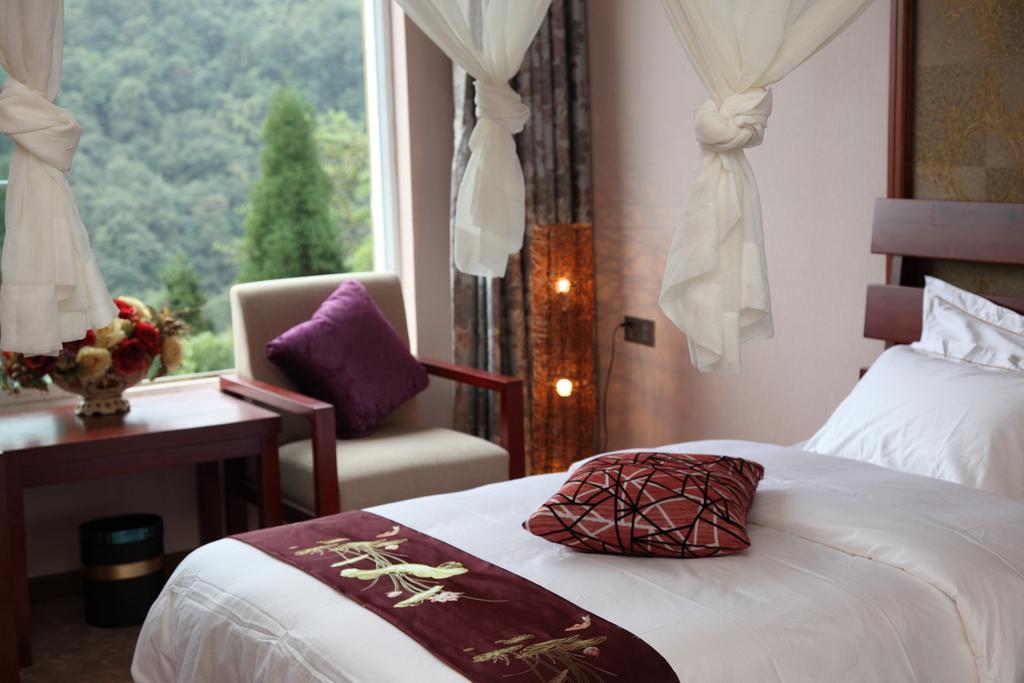 Panshan Tingquan Tuwo Holiday Resort Le-šan Pokoj fotografie